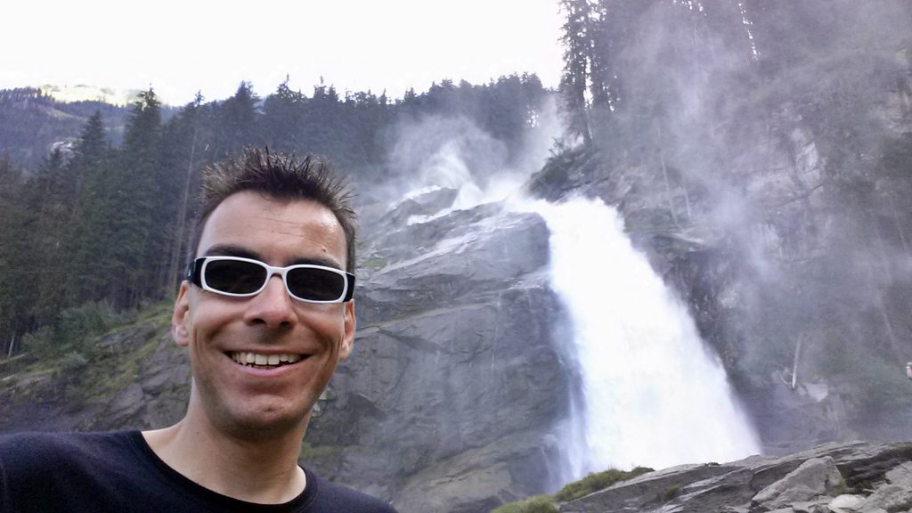 Didi Wöhrmann in front of the Kimml Waterfall